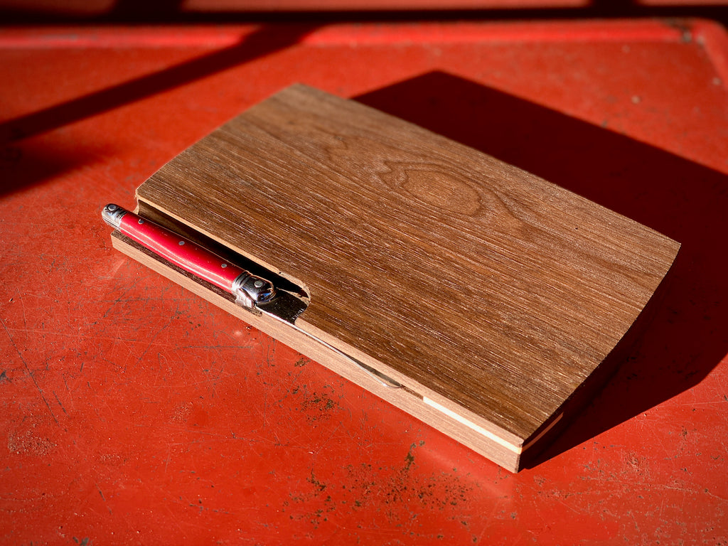 Hand Carved White Oak cutting board/cheeseboard with magnetized knife compartment holding a Laguiole Cheese Knife, picnic supply 