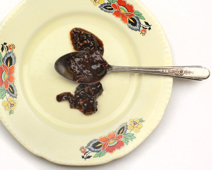 RedCamper Cherry Fig Mostarda displayed on retro spoon, thick rich texture visible dried cherries mustard seeds and spices